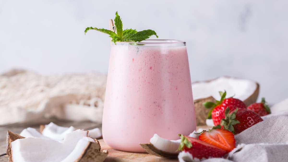 Healthy vegan coconut and strawberry indian lassi
