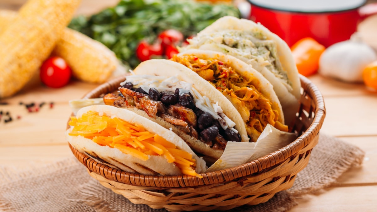 Combination of the typical South American Arepas in a woven basket